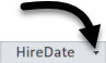 HireDate field header, with the drop-down arrow on the right indicated with an arrow.