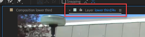 Tabs in Composition panel - the lower third.f4v layer is highlighted with a red rectangle around its tab.