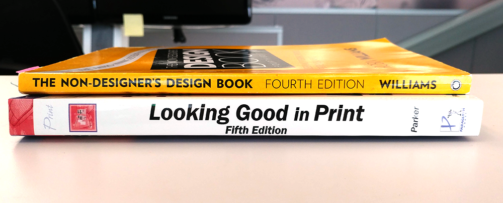 Photograph of two books stacked on top of each other, The Non-Designer's Design Book and Looking Good in Print.